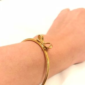 Kate spade gold plated bow bangle
